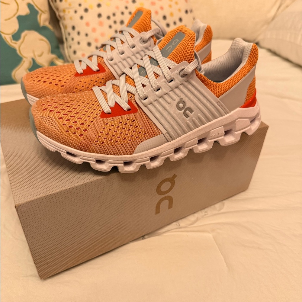 On Running Orange and Gray Athletic Shoes